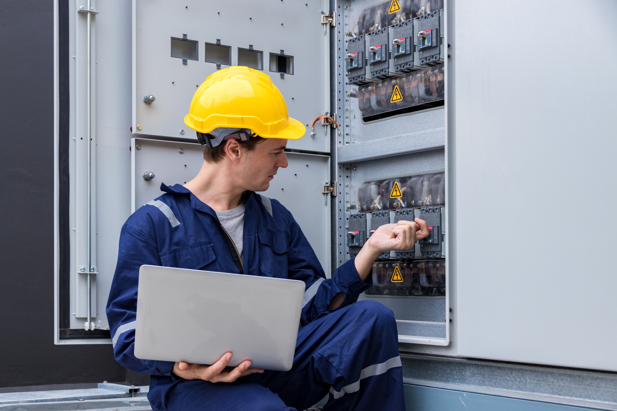 Electrical engineer working in control room.